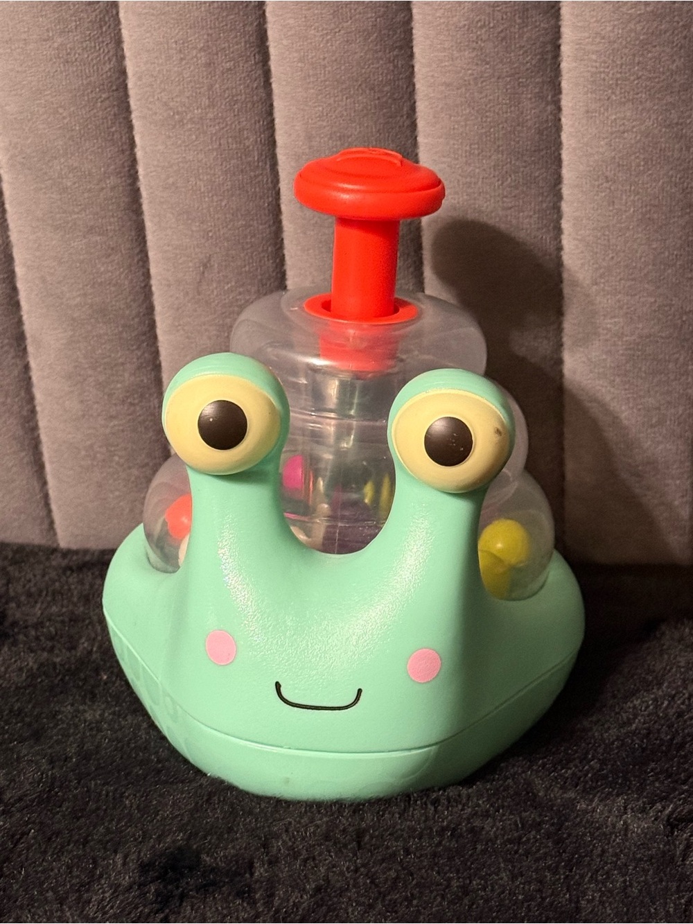 B. Toys Snail Pop & Roll Push Popper Toddler Sensory Toy Battat